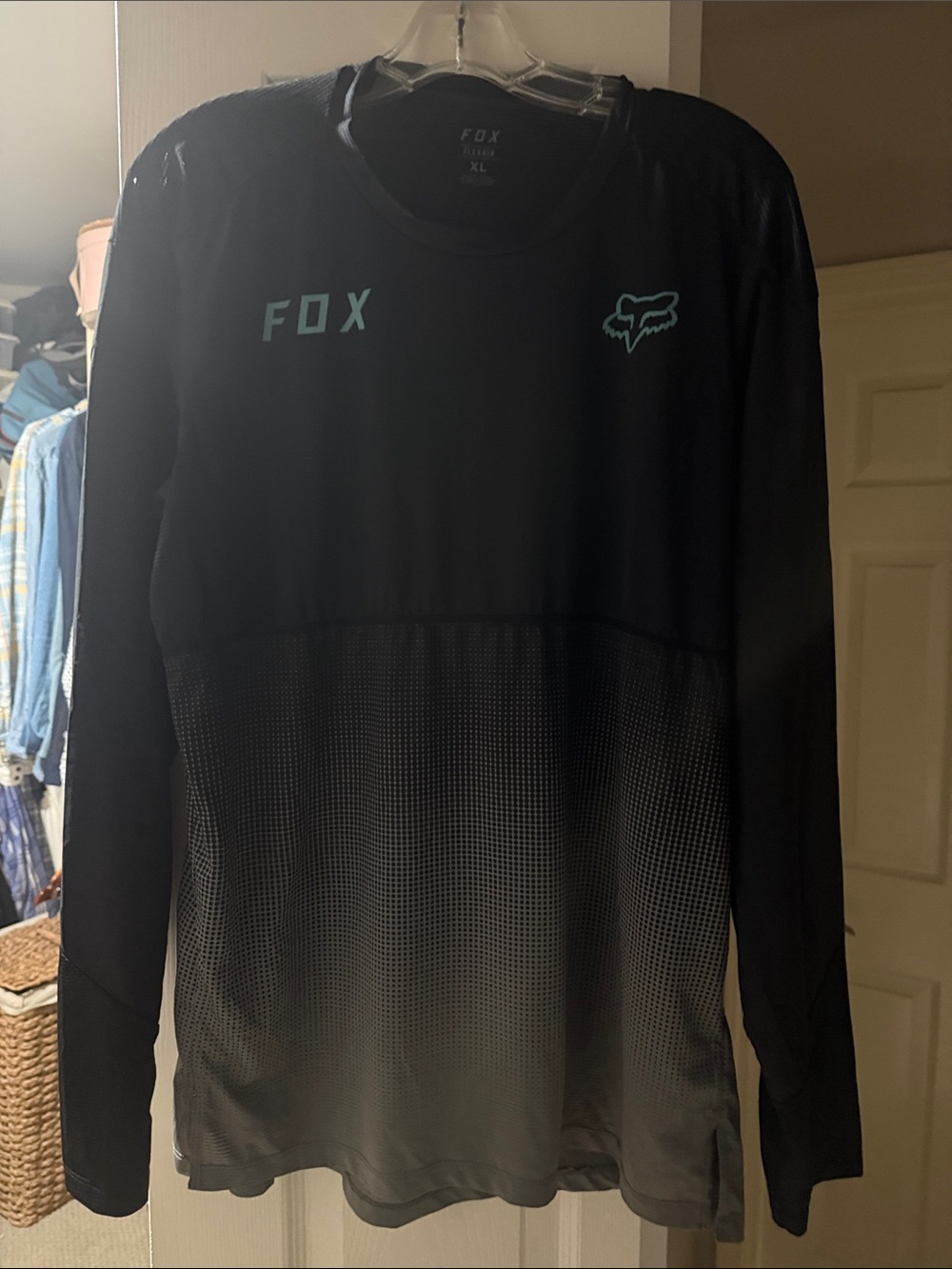 Fox Men’s Long-Sleeve Performance Shirt in Black with Teal Accents